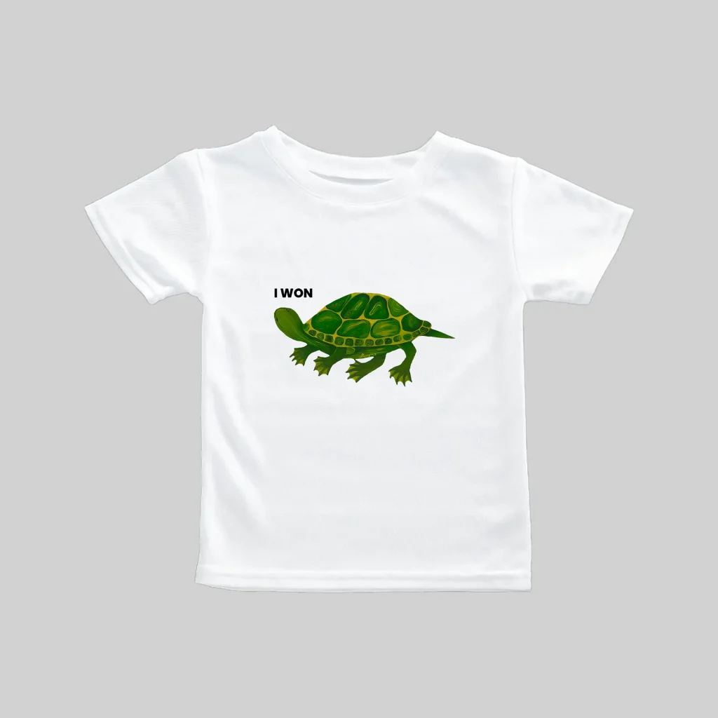 White t-shirt featuring a green turtle graphic in the center.