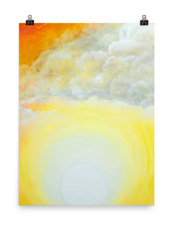 A bright sun rising beneath fluffy clouds in a colorful sky.