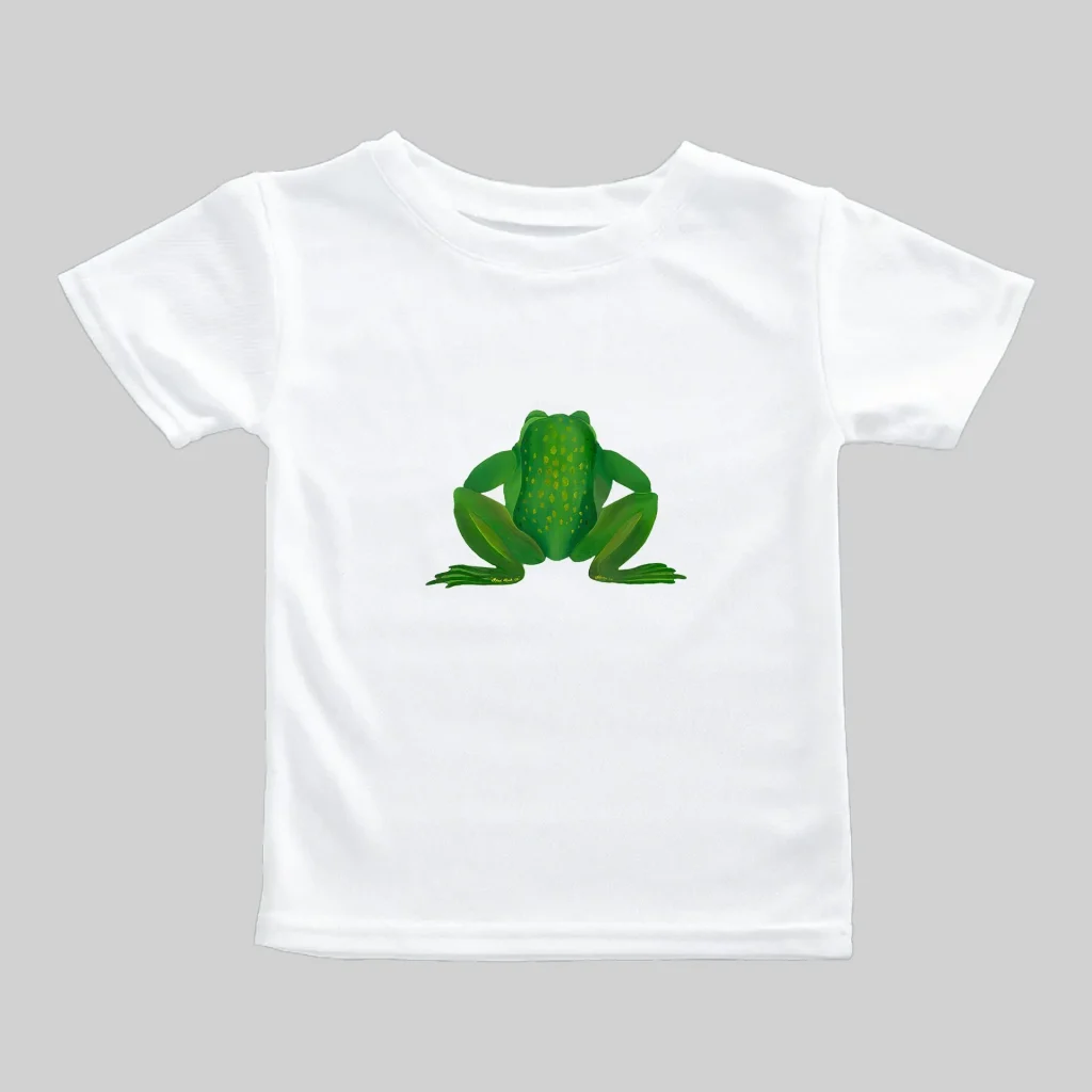 White t-shirt with a green frog graphic on the front.