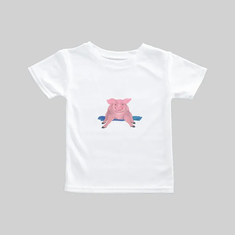 White t-shirt with a pink cartoon character and blue text design.