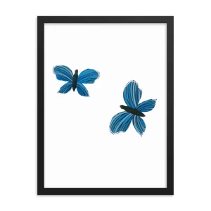 Two blue butterflies with black accents on a white background.