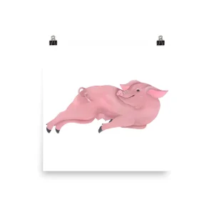 A pink pig lying down in a relaxed pose.