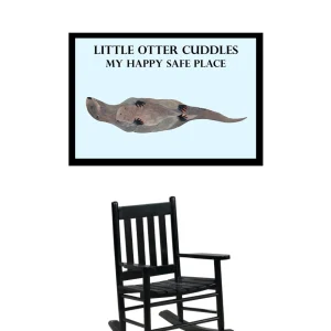 A rocking chair beneath a framed otter illustration with a loving message.