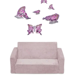 Pink butterfly wall decals above a light pink sofa.