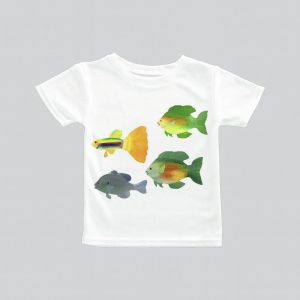 White t-shirt with colorful fish illustrations on the front.