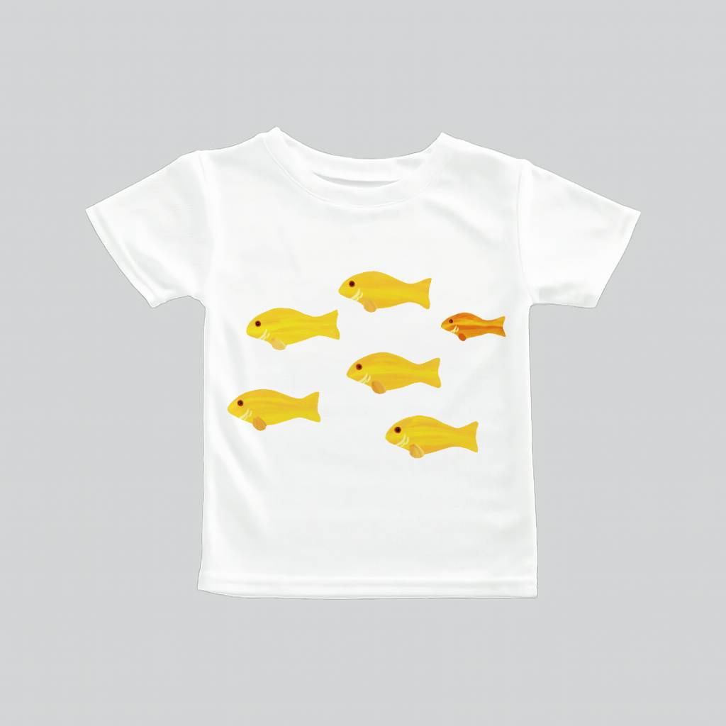 White t-shirt with yellow fish prints, one orange fish stands out.