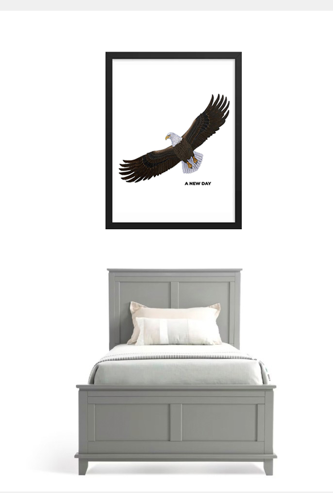 Framed eagle artwork above a gray bed with white bedding.