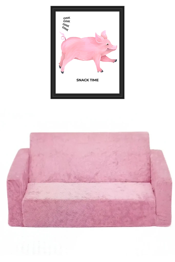 Pink couch with framed pig art above it.