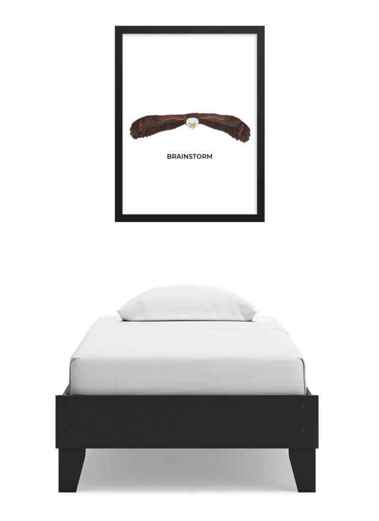 Minimalist bedroom with a simple bed and a framed butterfly artwork.