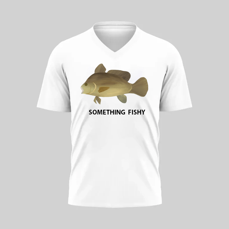 White t-shirt with a fish and "Something Fishy" text.